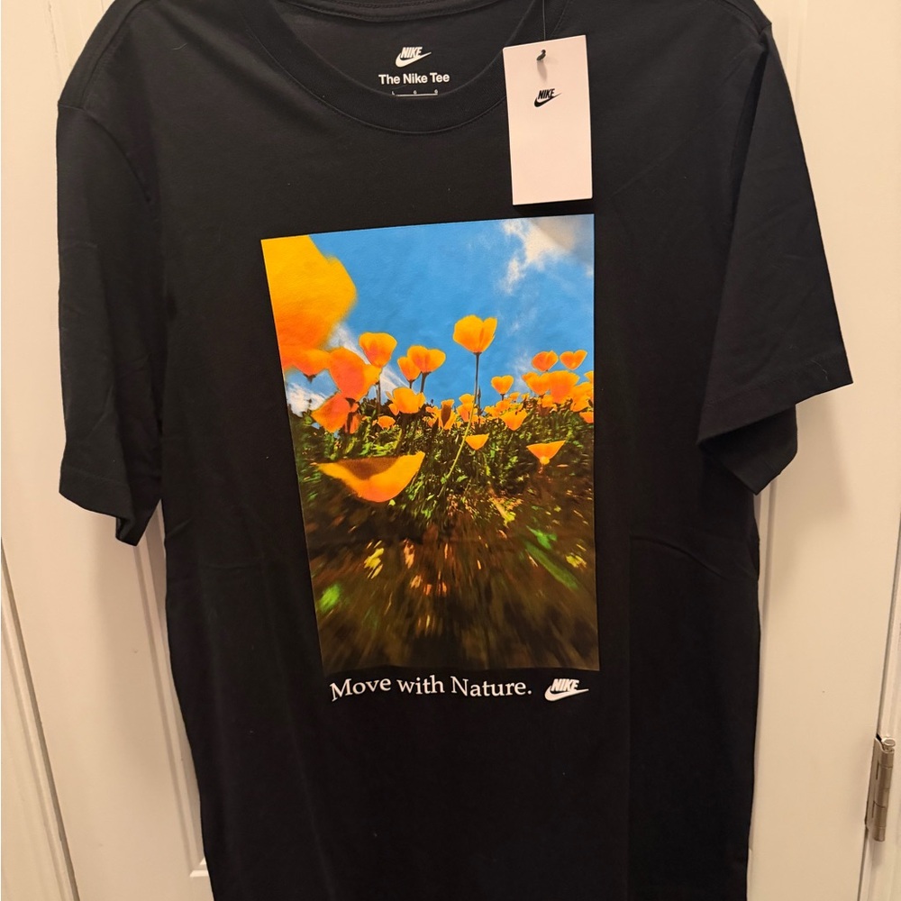 Nike Black Tee with Vibrant Floral Graphic